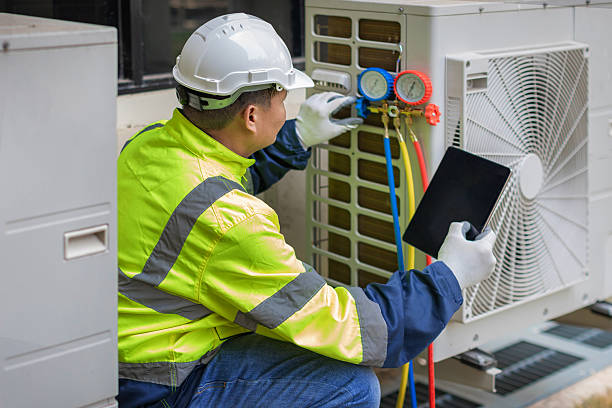 Professional Hvac technician working in Seville, FL